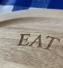 ''Eat Shit Fuck Die'' breadboard by Mark Perronet